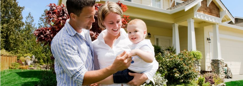 happy-family-in-front-of-house_cr